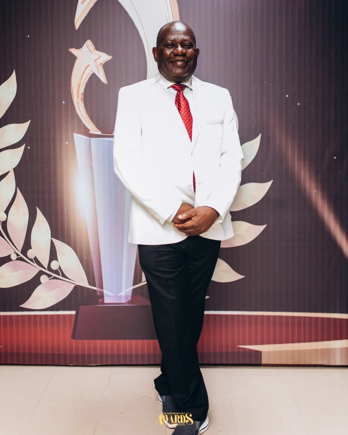 A distinguished honouree at the 2025 Redemption City Awards of Excellence ceremony